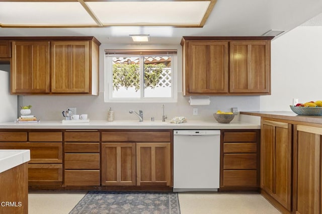 4907 Island View St, Oxnard, CA 93035 - kitchen featuring dishwasher, brown cabinets, and light countertops