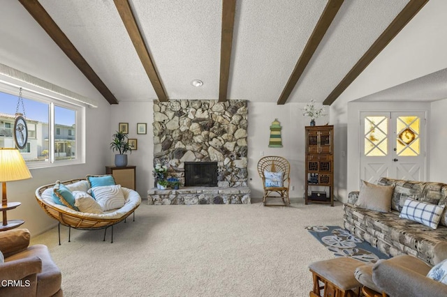 4907 Island View St, Oxnard, CA 93035 - living area with carpet, a textured ceiling, and a stone fireplace