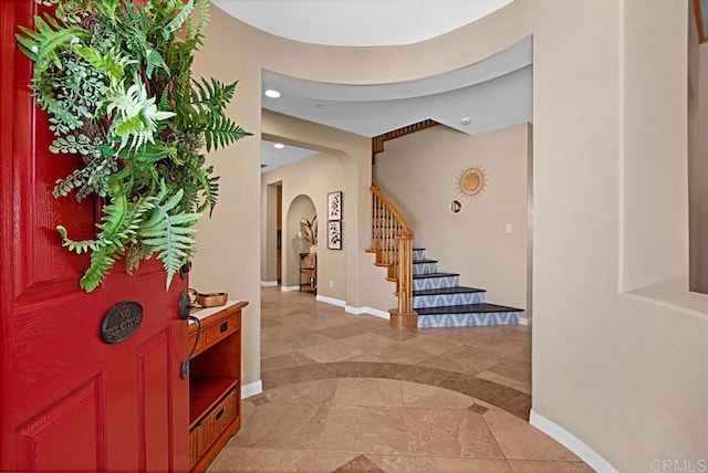 595 S Hidden Trails Rd, Escondido, CA 92027 - foyer with arched walkways, stairs, recessed lighting, and light tile patterned flooring
