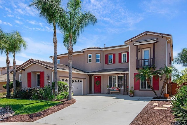 595 S Hidden Trails Rd, Escondido, CA 92027 - view of front of home featuring stucco siding, driveway, a garage, and a balcony