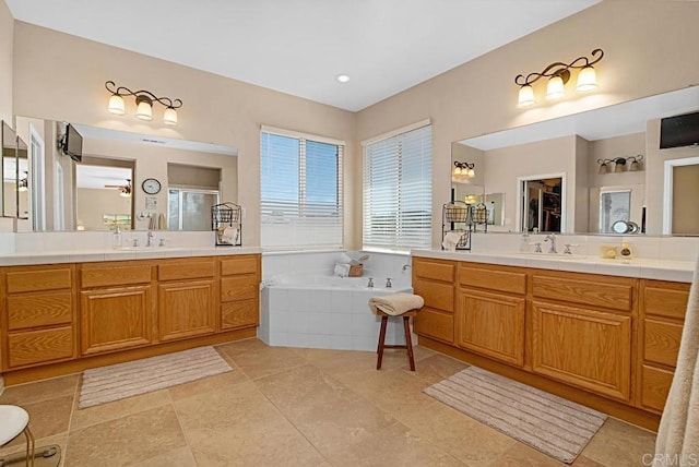 595 S Hidden Trails Rd, Escondido, CA 92027 - bathroom with two vanities, a bath, and a shower with door
