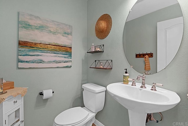 595 S Hidden Trails Rd, Escondido, CA 92027 - half bathroom featuring toilet and a sink