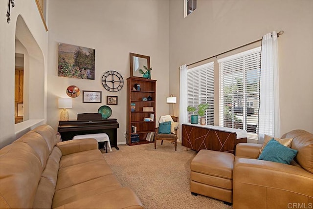595 S Hidden Trails Rd, Escondido, CA 92027 - carpeted living room featuring a towering ceiling and arched walkways