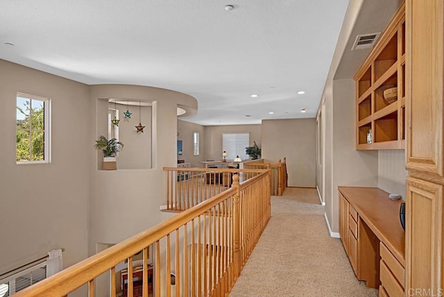 595 S Hidden Trails Rd, Escondido, CA 92027 - hallway with light colored carpet, an upstairs landing, and recessed lighting