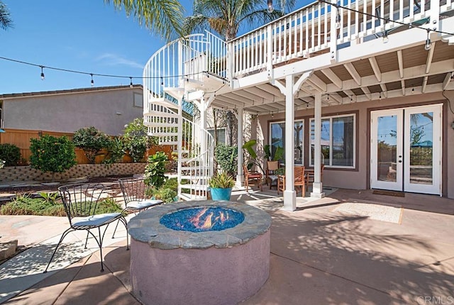 595 S Hidden Trails Rd, Escondido, CA 92027 - patio / terrace featuring a fire pit, stairway, a patio, and french doors