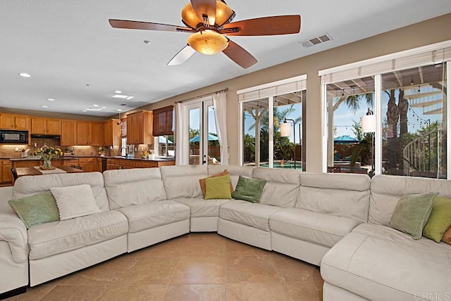 595 S Hidden Trails Rd, Escondido, CA 92027 - living area featuring ceiling fan and recessed lighting