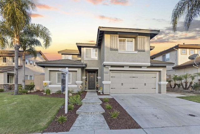 1209 Morgan Hill Dr, Chula Vista, CA 91913 - view of front of house with stucco siding, an attached garage, driveway, and a lawn