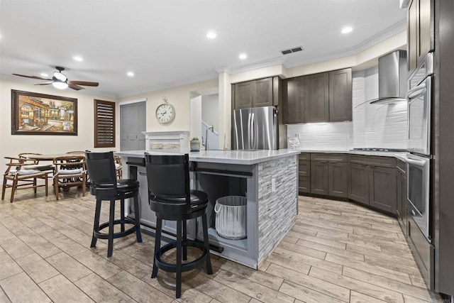 1209 Morgan Hill Dr, Chula Vista, CA 91913 - kitchen with freestanding refrigerator, ceiling fan, crown molding, light countertops, and an island with sink