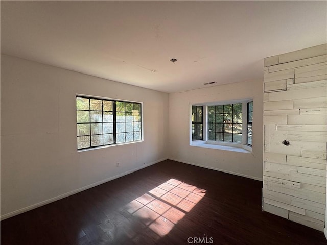 28869 Paradise Rd, Castaic, CA 91384 - unfurnished room with wood finished floors and baseboards