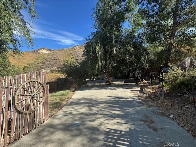 28869 Paradise Rd, Castaic, CA 91384 - view of street featuring a mountain view and a gated entry