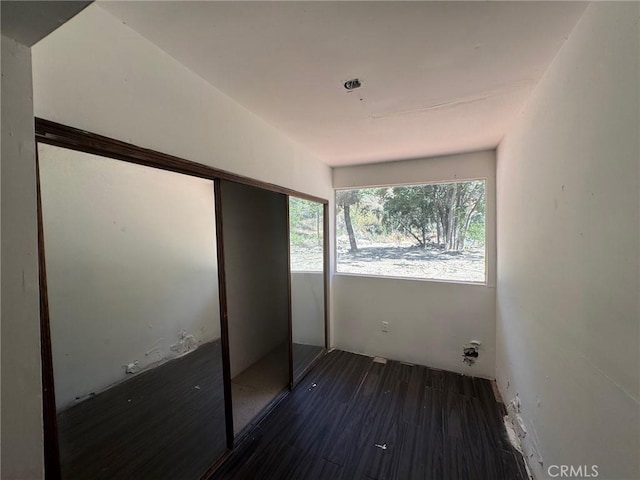 28869 Paradise Rd, Castaic, CA 91384 - unfurnished bedroom featuring dark wood finished floors and a closet