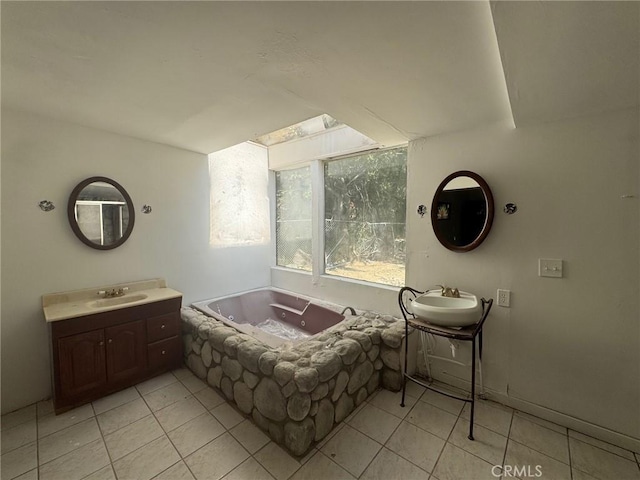 28869 Paradise Rd, Castaic, CA 91384 - full bathroom with a garden tub and tile patterned flooring
