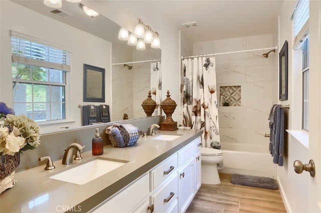 31008 Longview Ln E, Coarsegold, CA 93614 - full bathroom featuring shower / bathtub combination with curtain, double vanity, and wood finished floors