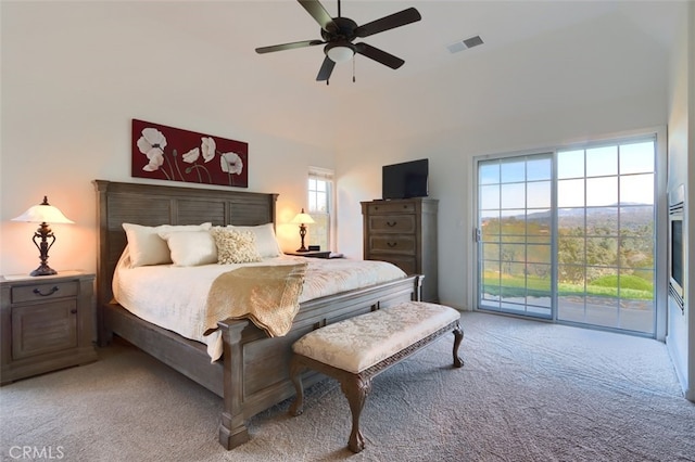 31008 Longview Ln E, Coarsegold, CA 93614 - bedroom featuring access to outside, light colored carpet, a towering ceiling, and ceiling fan