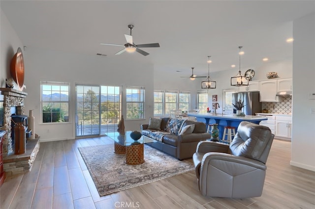 31008 Longview Ln E, Coarsegold, CA 93614 - living area featuring ceiling fan, light wood-type flooring, and recessed lighting
