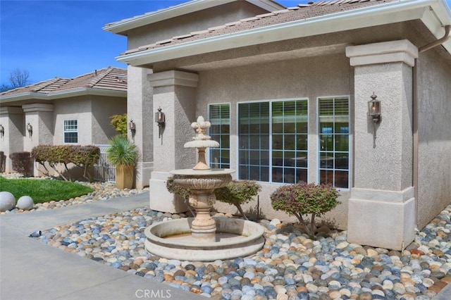 31008 Longview Ln E, Coarsegold, CA 93614 - doorway to property featuring stucco siding and a tiled roof