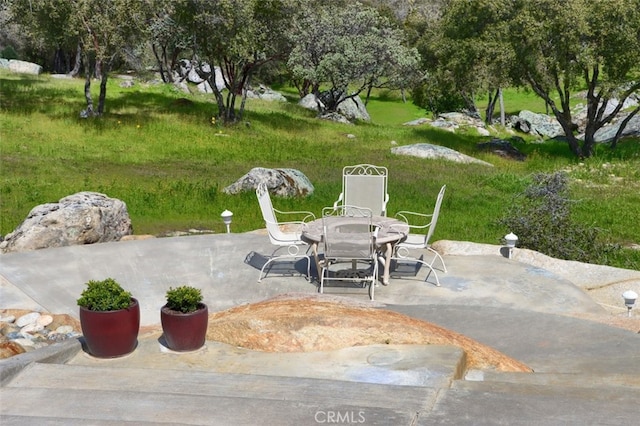 31008 Longview Ln E, Coarsegold, CA 93614 - view of patio / terrace featuring outdoor dining space