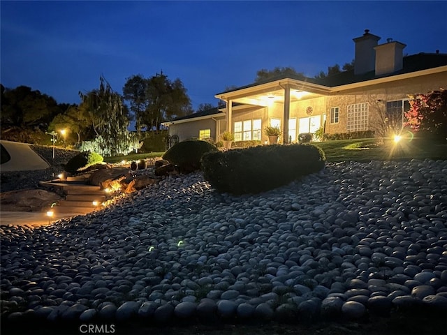 31008 Longview Ln E, Coarsegold, CA 93614 - back of house at twilight with a chimney