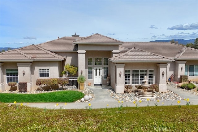 31008 Longview Ln E, Coarsegold, CA 93614 - rear view of property featuring stucco siding and a tile roof