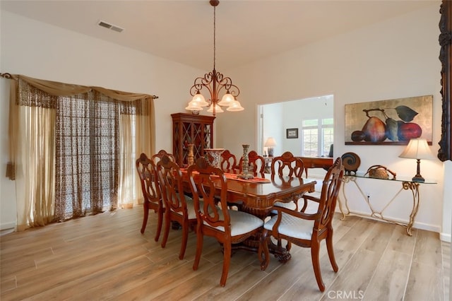 31008 Longview Ln E, Coarsegold, CA 93614 - dining room with light wood-type flooring and a chandelier