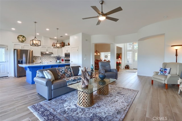 31008 Longview Ln E, Coarsegold, CA 93614 - living room featuring light wood-style floors, ceiling fan, healthy amount of natural light, and recessed lighting