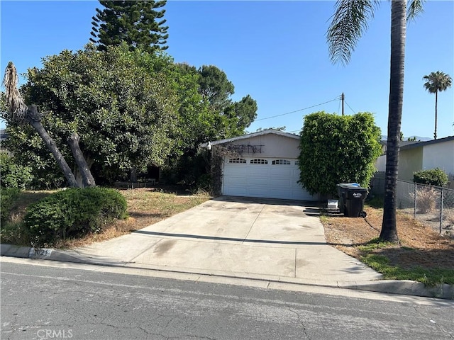 1021 E Gaillard St, Azusa, CA 91702 - view of front of property with a garage and driveway