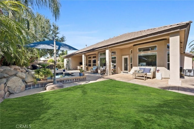 403 Stone Cross Dr, Bakersfield, CA 93312 - rear view of property with outdoor lounge area, a lawn, stucco siding, a patio, and an outdoor pool