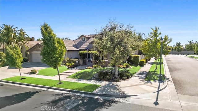 403 Stone Cross Dr, Bakersfield, CA 93312 - view of property hidden behind natural elements with concrete driveway, a tile roof, stucco siding, and an attached garage