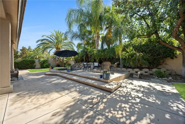 403 Stone Cross Dr, Bakersfield, CA 93312 - fenced backyard featuring a patio area