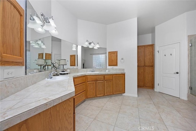 403 Stone Cross Dr, Bakersfield, CA 93312 - full bathroom with a shower stall, double vanity, and tile patterned floors