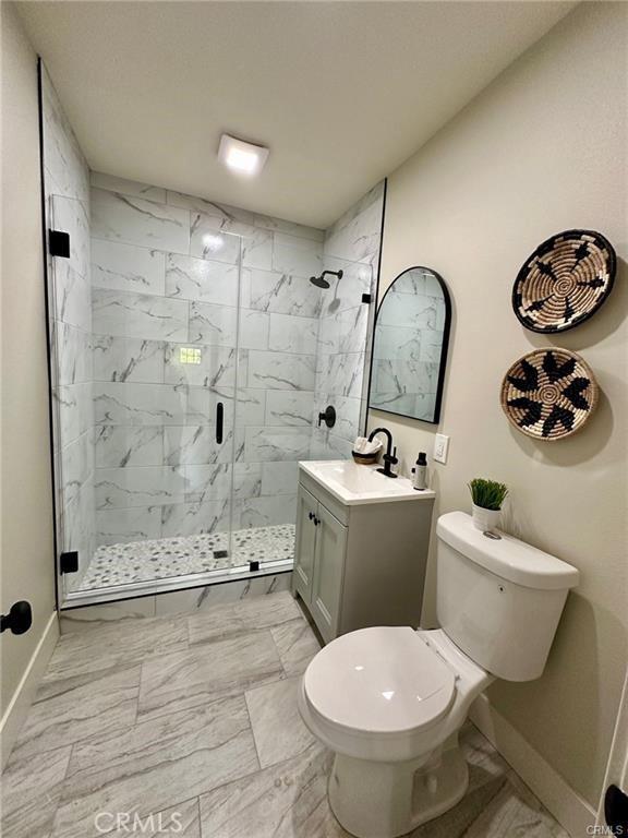 2209 W Glendon Way, Alhambra, CA 91803 - full bathroom featuring a marble finish shower, vanity, and marble look tile flooring