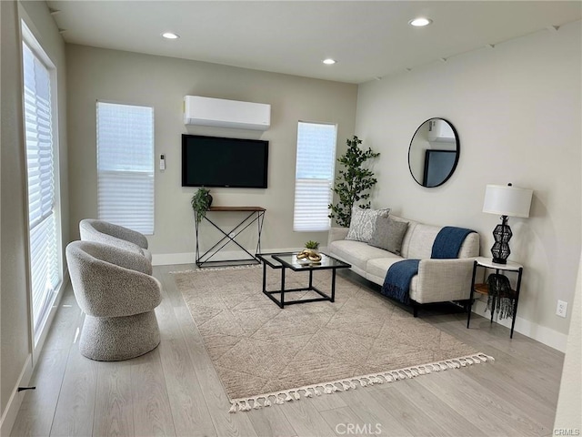 2209 W Glendon Way, Alhambra, CA 91803 - living room featuring a wall unit AC, wood finished floors, and recessed lighting