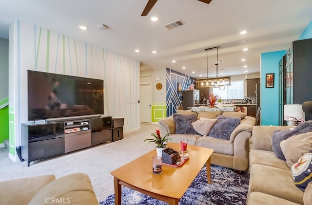 1905 Soho Ln Unit 2, Chula Vista, CA 91915 - carpeted living room featuring a ceiling fan, a chandelier, recessed lighting, and a decorative wall