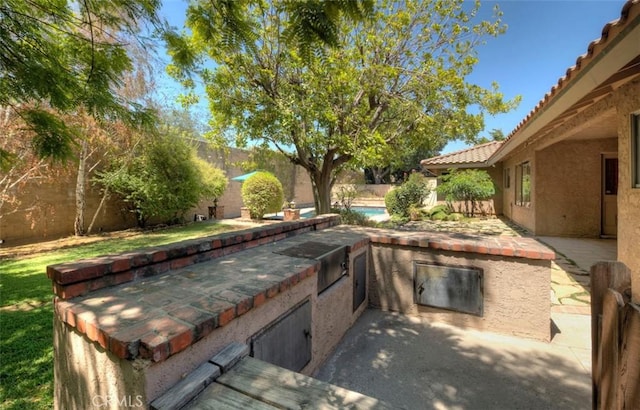 1023 Don Pablo Dr, Arcadia, CA 91006 - fenced backyard with area for grilling and a patio