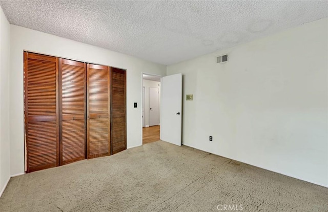 1023 Don Pablo Dr, Arcadia, CA 91006 - unfurnished bedroom featuring carpet, a closet, and a textured ceiling