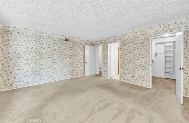 1023 Don Pablo Dr, Arcadia, CA 91006 - carpeted spare room featuring wallpapered walls and a textured ceiling