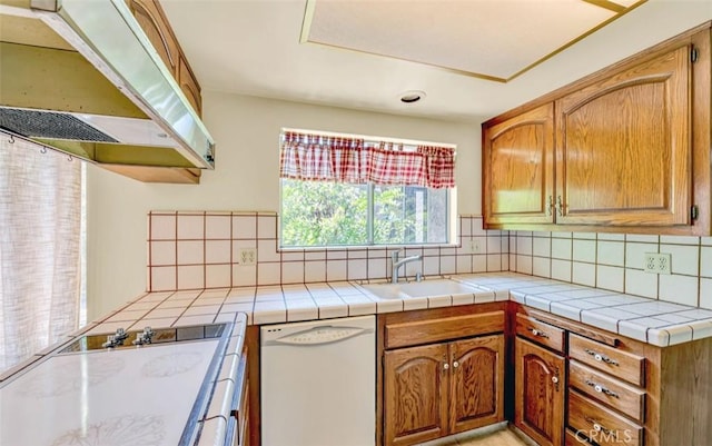1023 Don Pablo Dr, Arcadia, CA 91006 - kitchen with dishwasher, under cabinet range hood, decorative backsplash, and brown cabinets