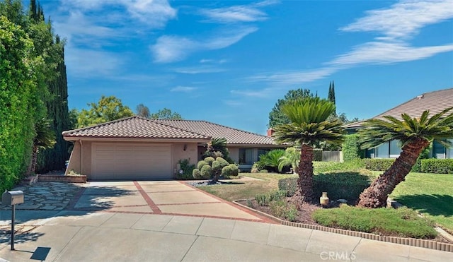 1023 Don Pablo Dr, Arcadia, CA 91006 - view of front of home with an attached garage, a tiled roof, concrete driveway, and stucco siding