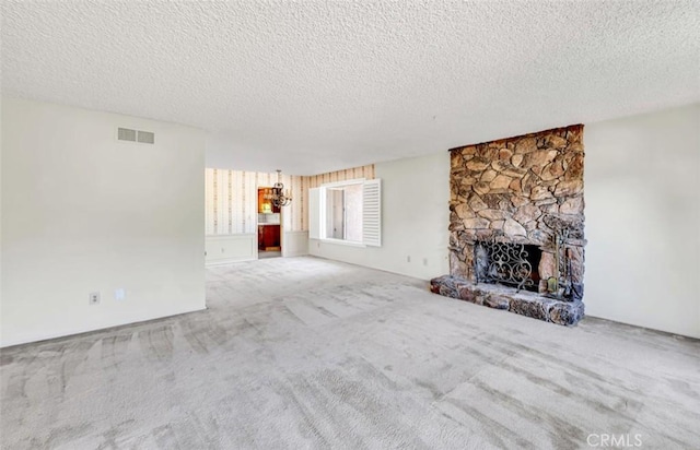 1023 Don Pablo Dr, Arcadia, CA 91006 - unfurnished living room featuring a textured ceiling, carpet floors, and a stone fireplace