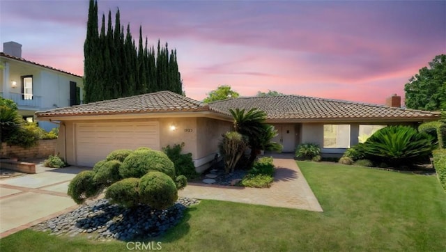 1023 Don Pablo Dr, Arcadia, CA 91006 - view of front of property featuring an attached garage, a front lawn, a chimney, concrete driveway, and a tile roof
