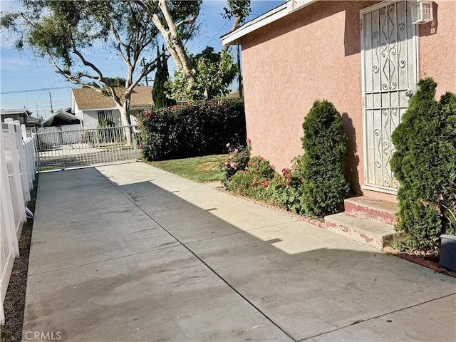 1203 W 134th Pl, Compton, CA 90222 - view of patio / terrace with entry steps and a gate