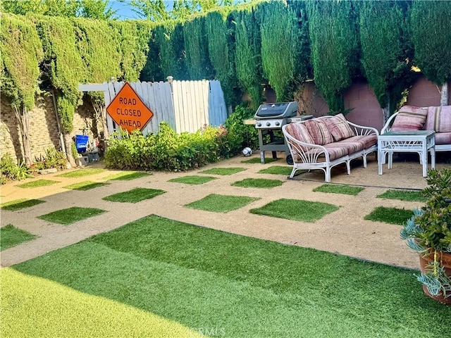 1203 W 134th Pl, Compton, CA 90222 - view of yard featuring a patio and an outdoor living space
