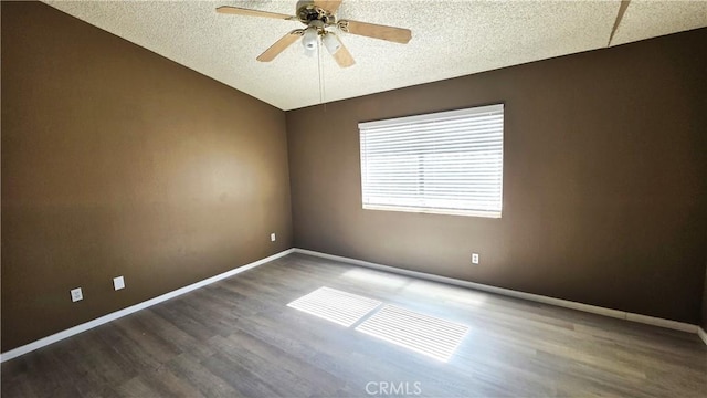 37432 Whitehall Ln, Palmdale, CA 93550 - spare room with wood finished floors, ceiling fan, a textured ceiling, and lofted ceiling