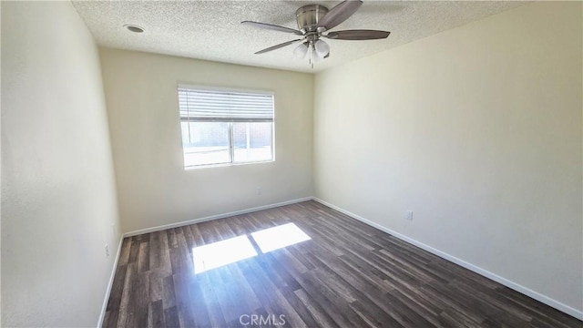 37432 Whitehall Ln, Palmdale, CA 93550 - spare room with dark wood-type flooring, a ceiling fan, and a textured ceiling