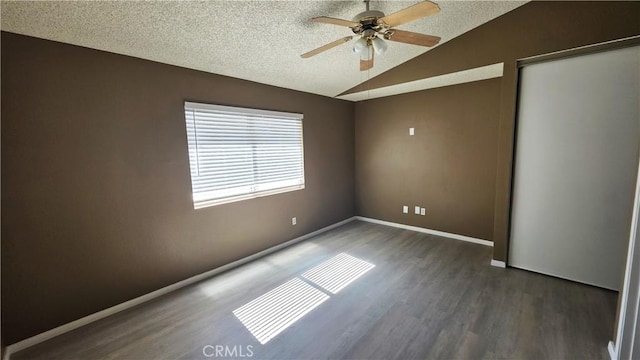37432 Whitehall Ln, Palmdale, CA 93550 - unfurnished bedroom featuring lofted ceiling, a textured ceiling, wood finished floors, and a ceiling fan