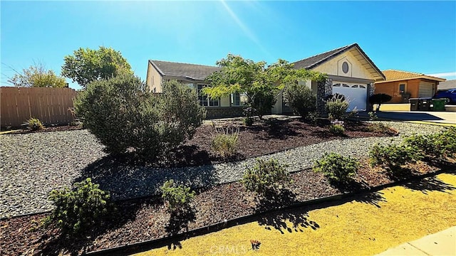 37432 Whitehall Ln, Palmdale, CA 93550 - ranch-style house featuring a garage, driveway, and stucco siding