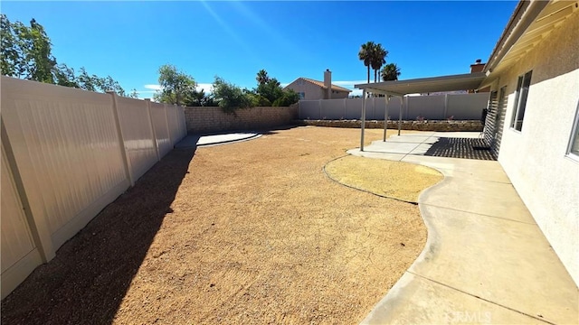 37432 Whitehall Ln, Palmdale, CA 93550 - fenced backyard with a patio