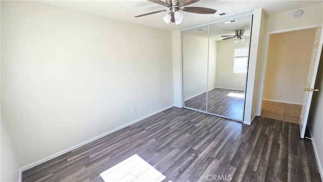 37432 Whitehall Ln, Palmdale, CA 93550 - unfurnished bedroom featuring wood finished floors, a closet, and a ceiling fan