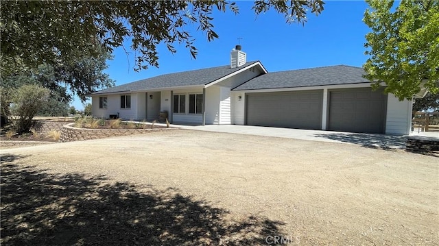 5335 Play Doe Ln, Paso Robles, CA 93446 - single story home with an attached garage, driveway, a chimney, and a shingled roof