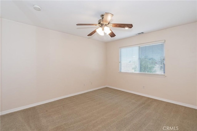 5335 Play Doe Ln, Paso Robles, CA 93446 - empty room featuring light colored carpet, ceiling fan, and a smoke detector